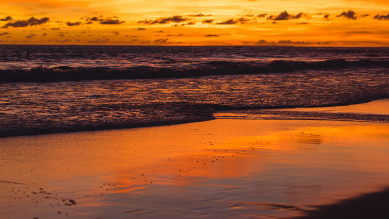 a beautiful orange Balearic sunset beach