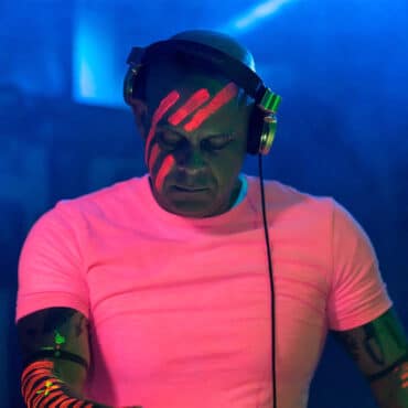 neon themed image of dj / producer Jess Haze in pink t shirt
