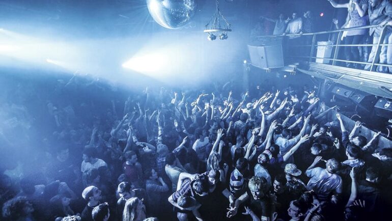 crowd dancing inside club fabric London