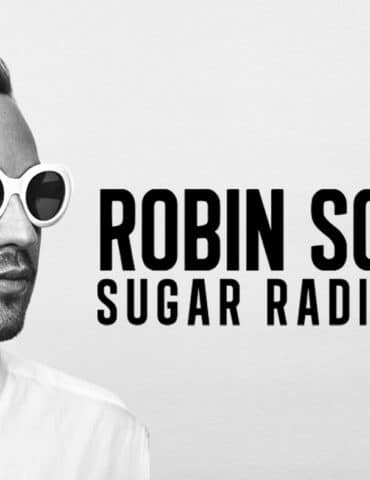 image of dj / producer Robin-Shulz wearing black sunglasses