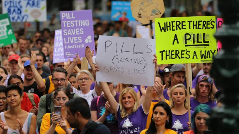 Demonstrators marching for pill testing at clubs and festivals 